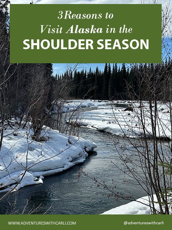 poster: 3 reasons to visit alaska in the shoulder season background is river running through snow banks with mountains in distance