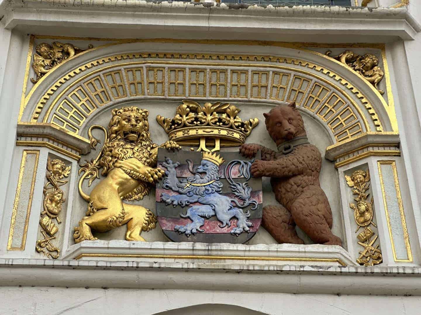 one day in bruges - lion and bear ornamentation