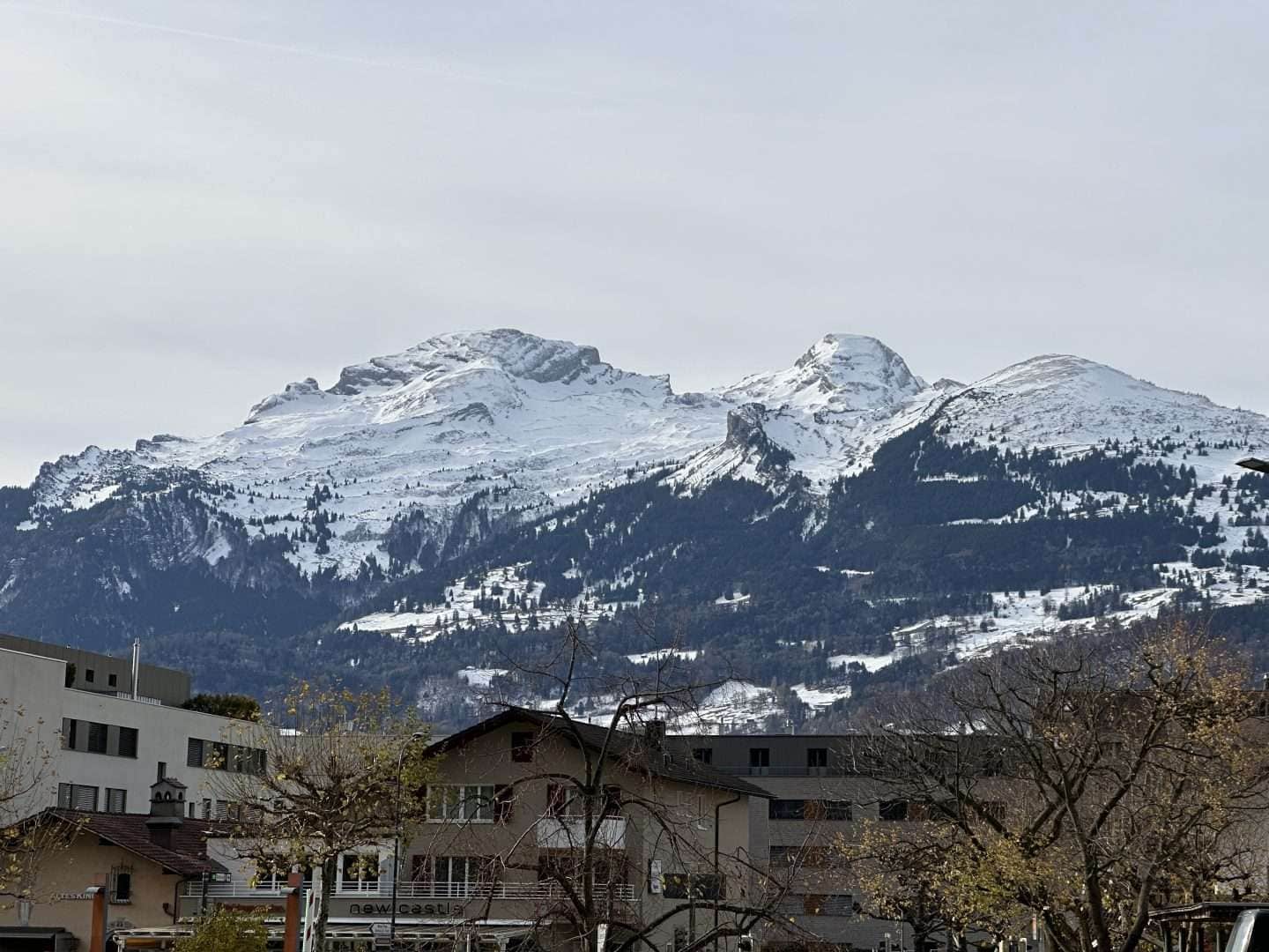 view snow capped mountains in vaduz liechtenstein