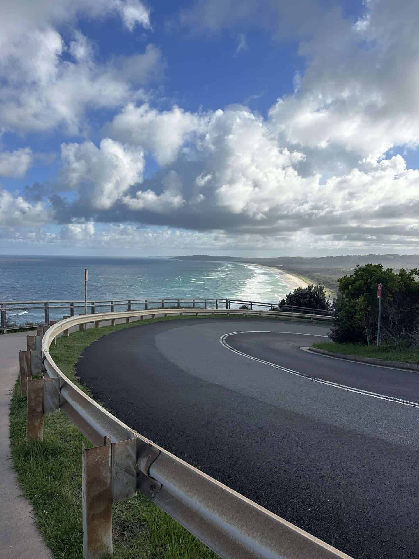 road overlooking ocean in cape byron state park