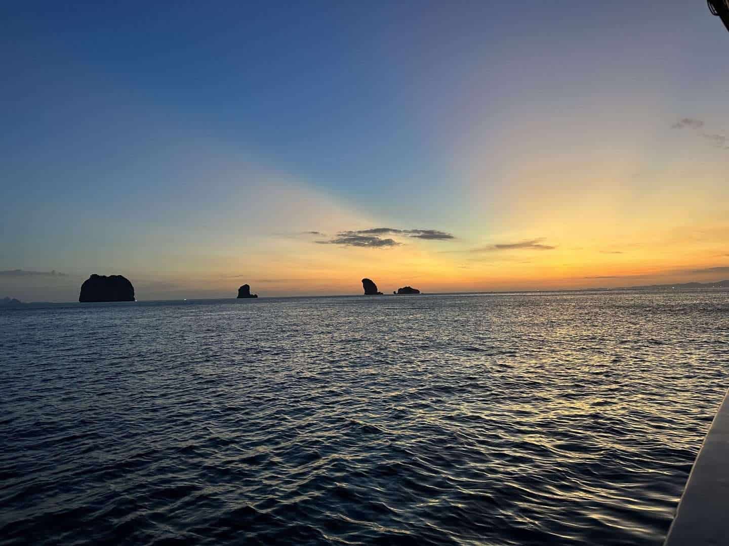 sunset over water
krabi sunset tours