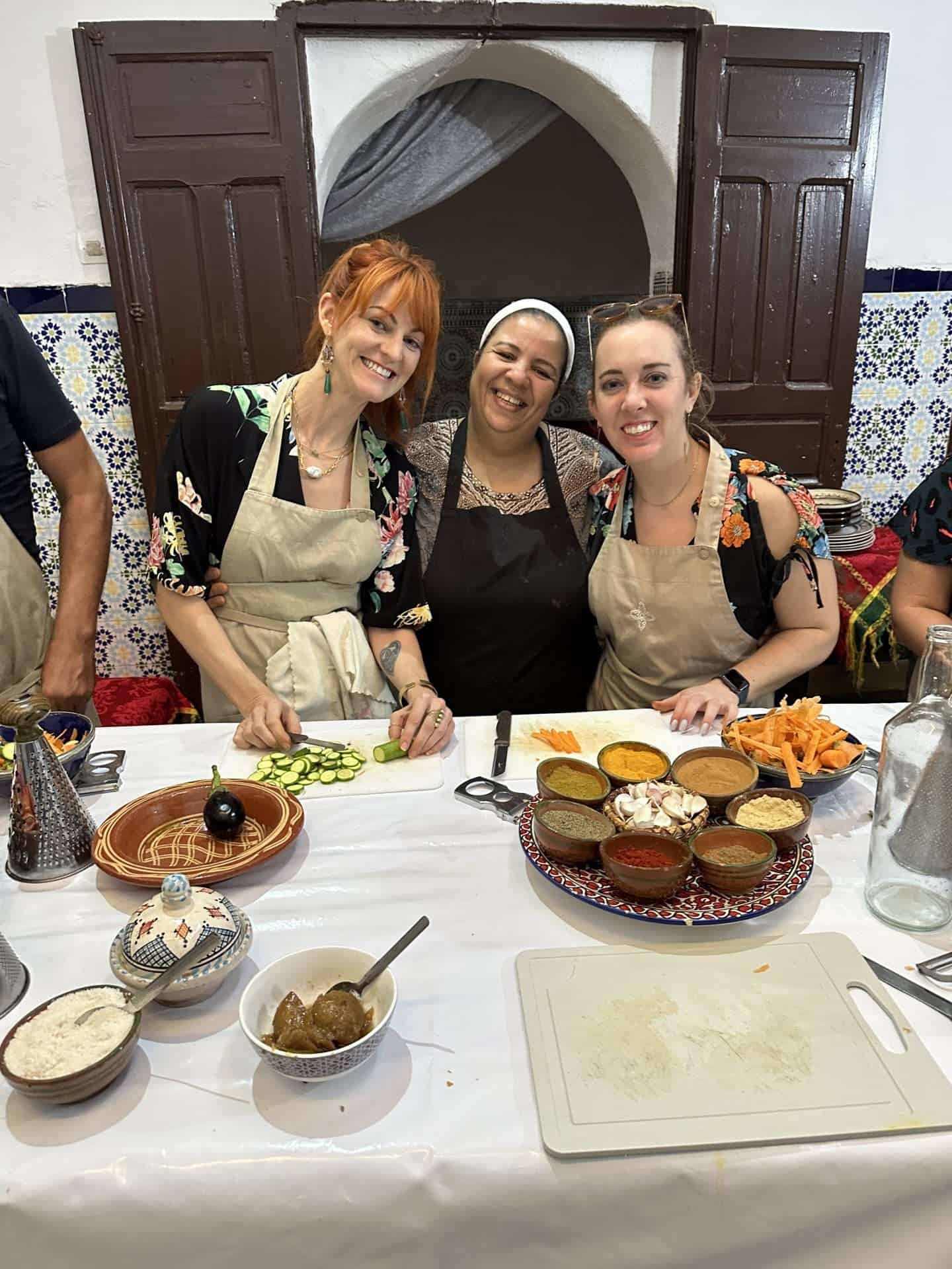 carli, brittany and chef laila during a marrakech cooking class