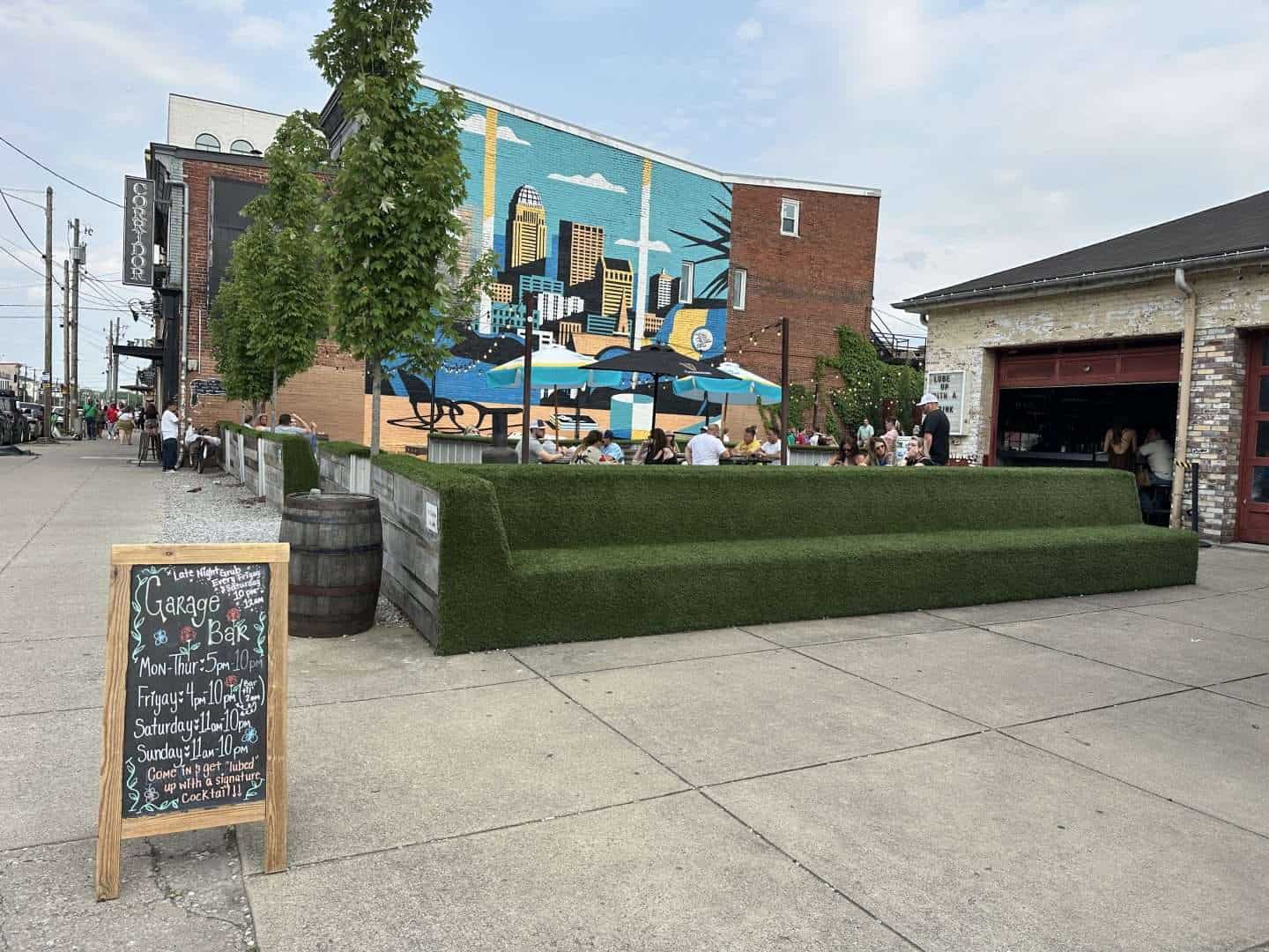 exterior patio of garage bar and mural wall in NuLu neighborhood of Louisville KY
