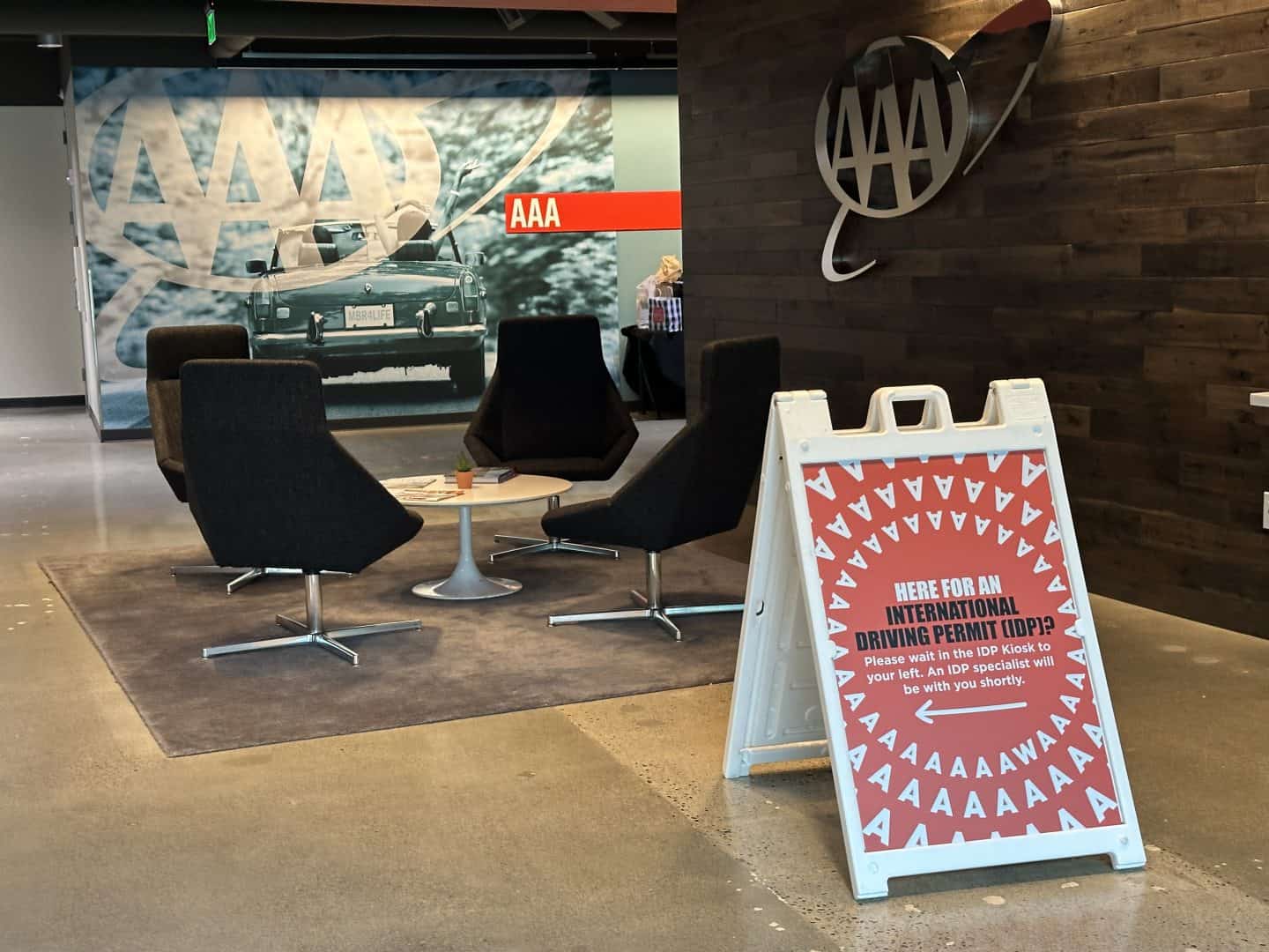lobby of AAA washington with sign about getting an view of international drivers permit in Washington