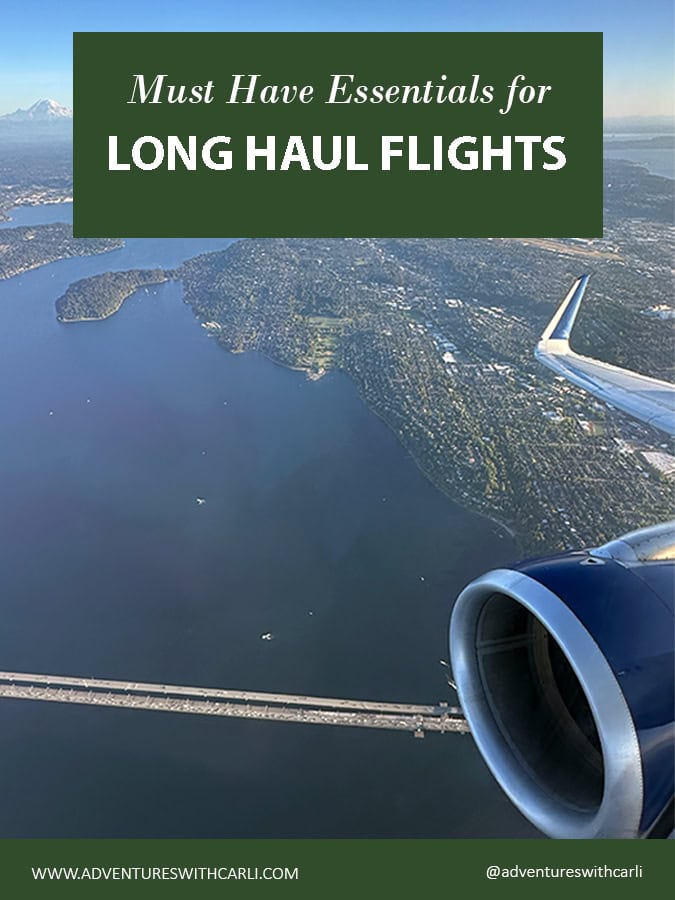 poster reading: must have essentials for long haul flights. background image looking out airplane with wing flying over lake washington with seattle below and mt rainier in distance