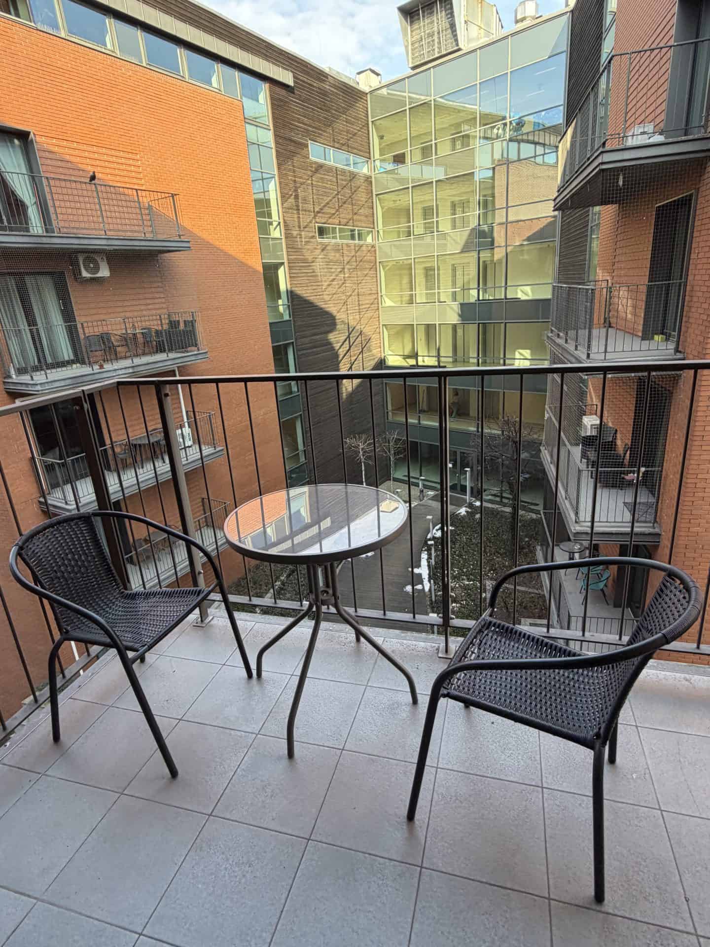 balcony overlooking turnau city aparthotel courtyard