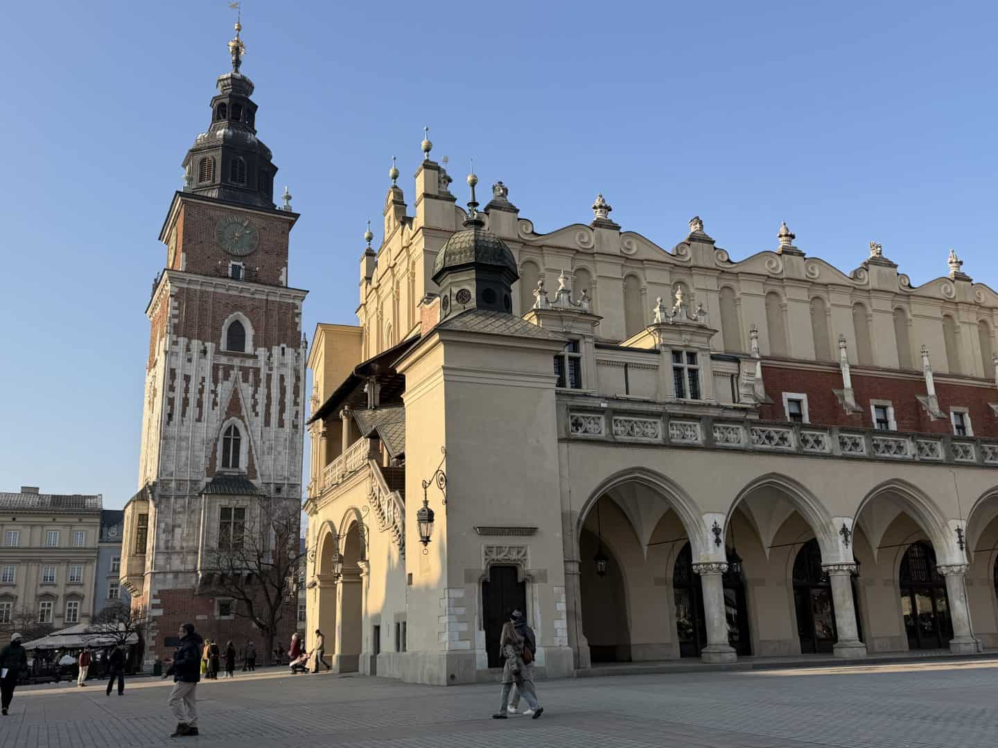 exterior view of cloth hall and town hall tower in old town krakow