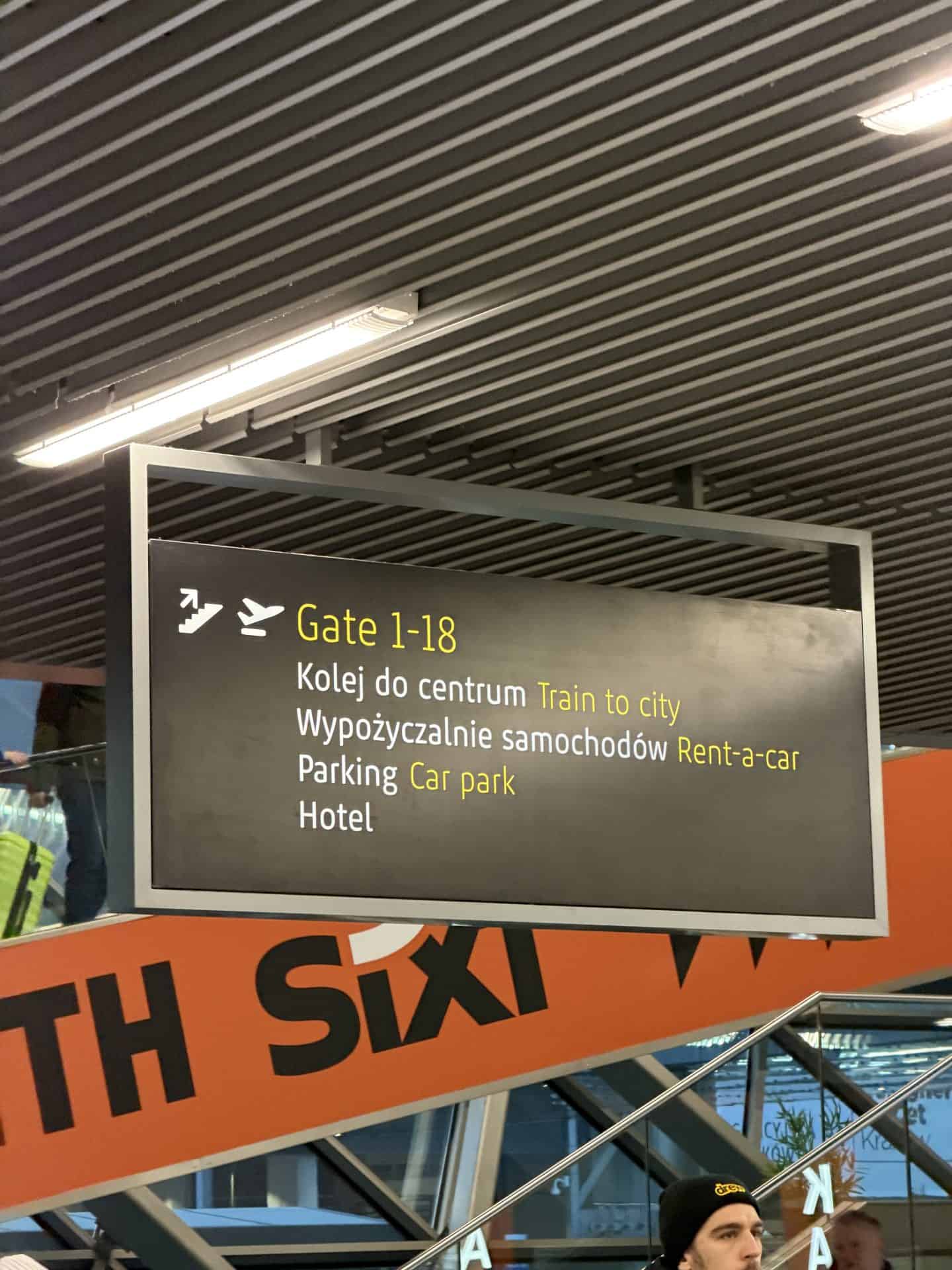 signage for krakow airport to the city centre train