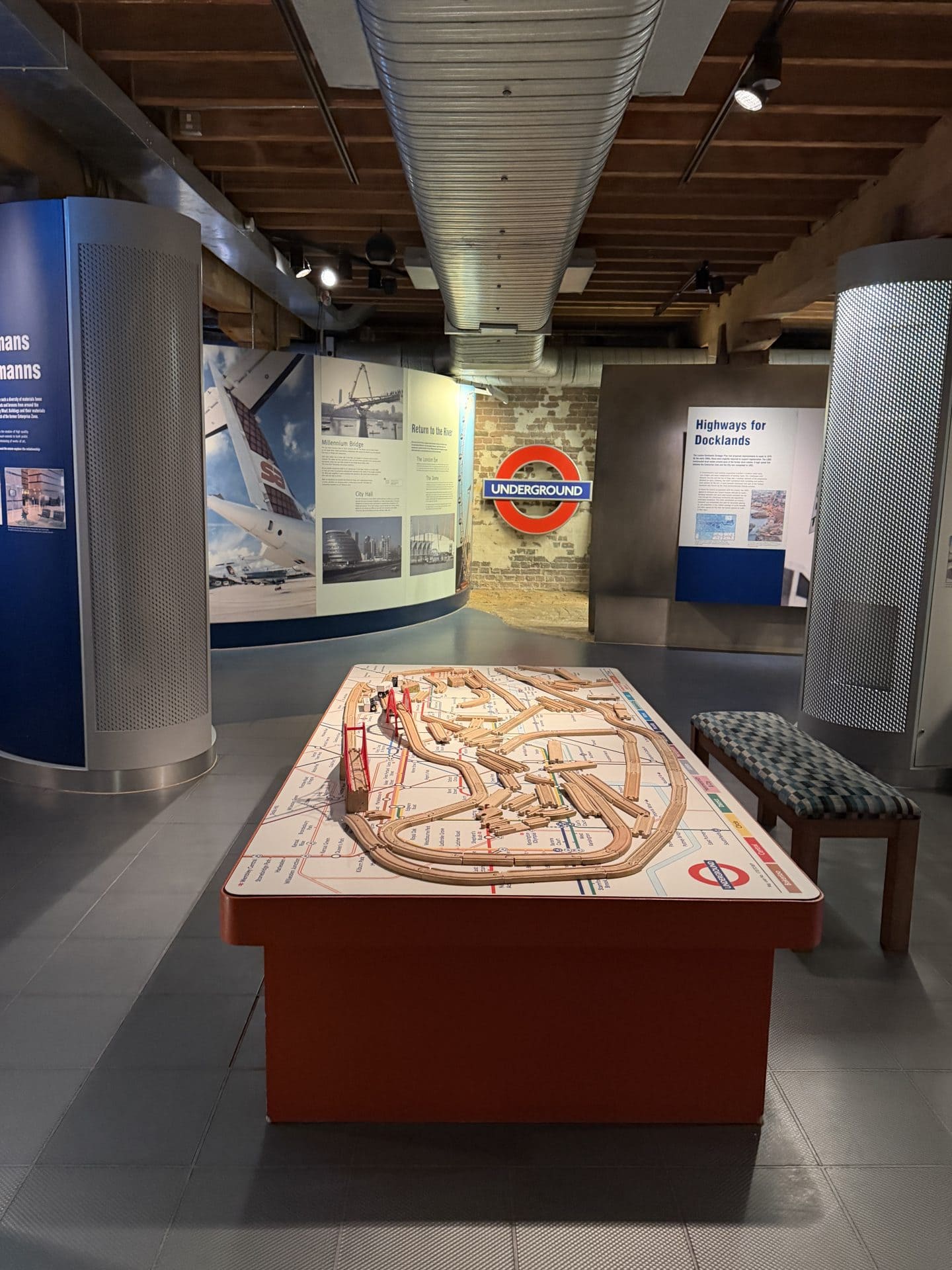table with subway map and interactive tracks at london dockland museum