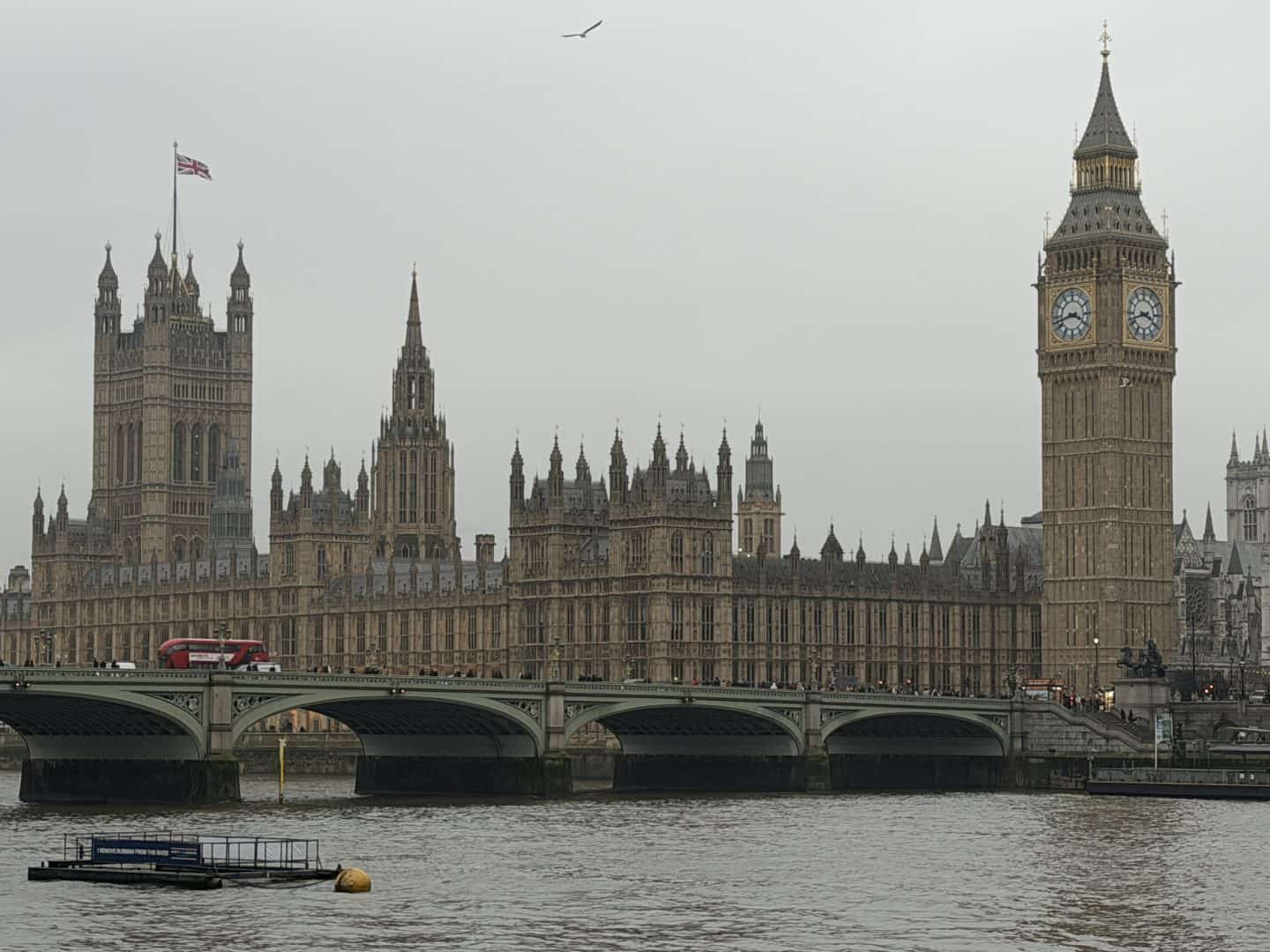 view of parliament and big ben across the thames river