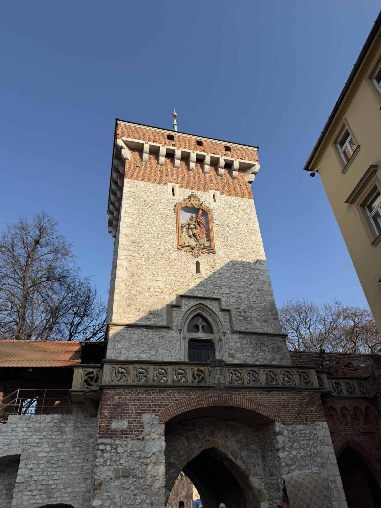 view of 13th century gate and tower in krakow