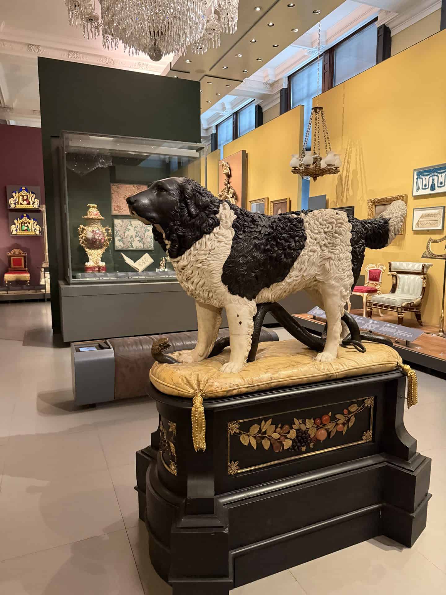 black & white dog statue at the victoria & albert museum in london