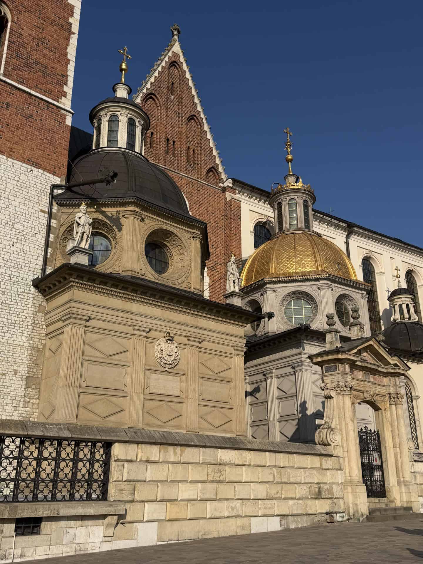 dual church domes outside wawel castle in krakow 
