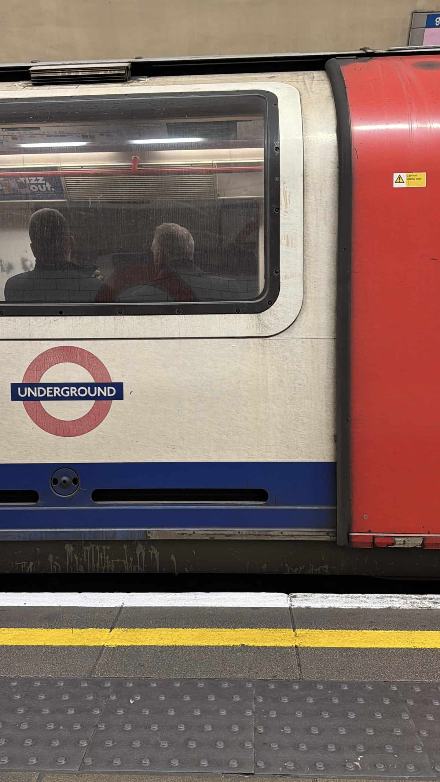image of tube at station in london underground