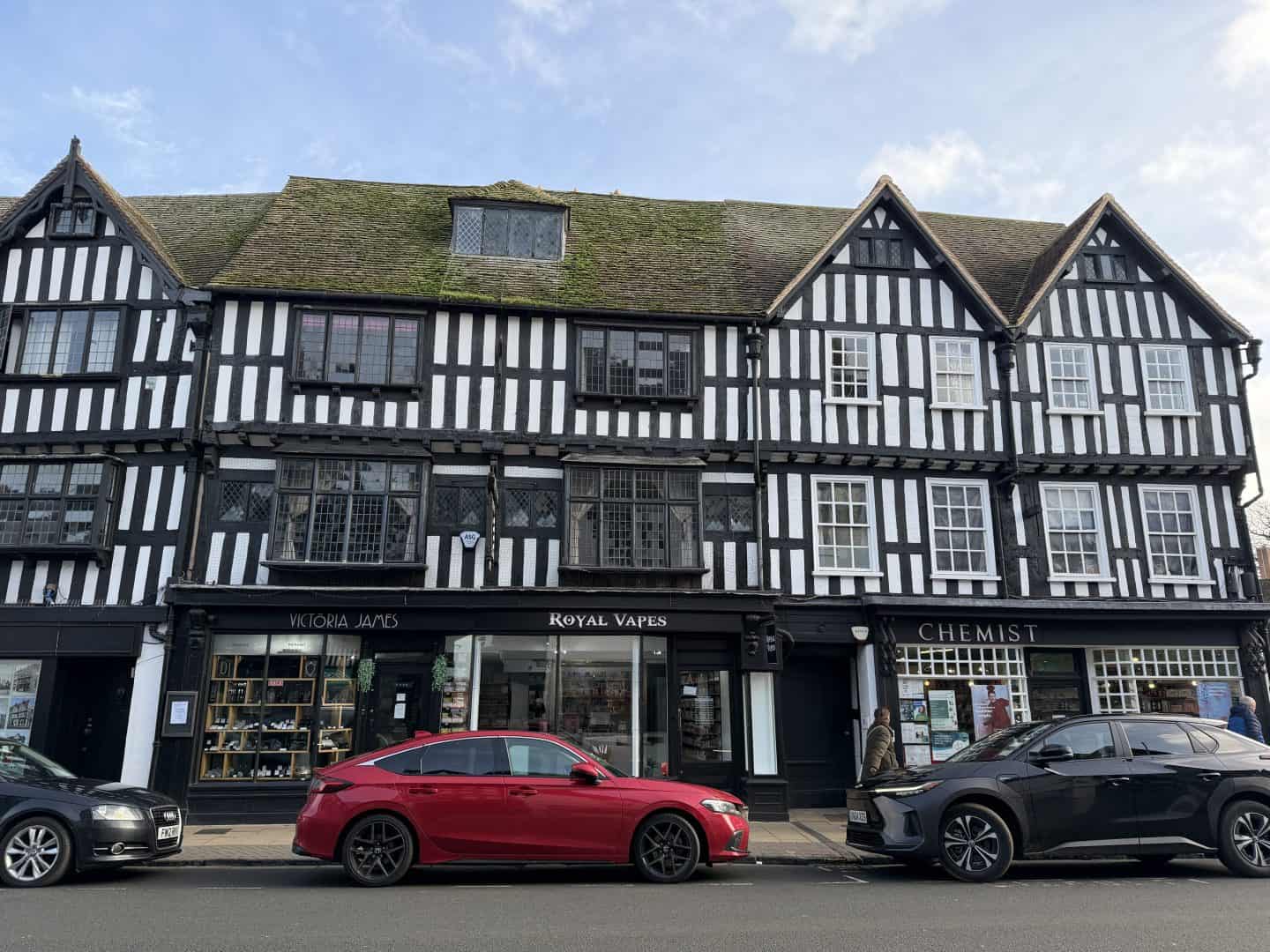 historic tudor buildings with thatched roofs in stratford upon avon