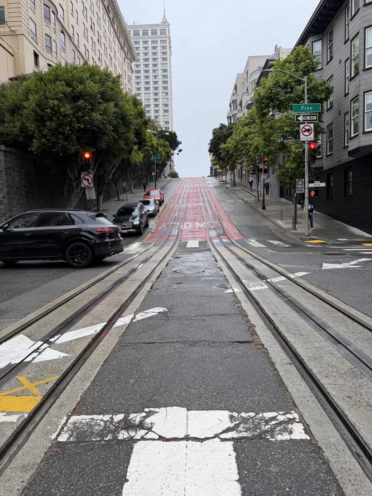 view from middle of street looking up Powell Street hill in San Francisco