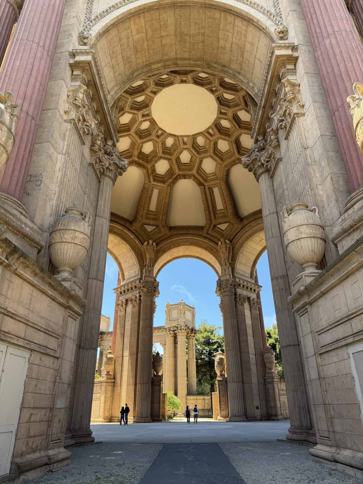 view of large outdoor concrete rotunda on a sunny day