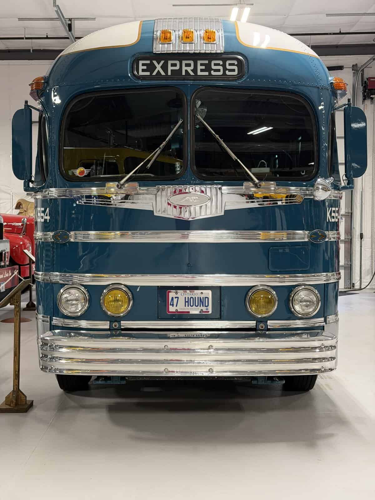 keystone_museum_greyhound_bus - Adventures with Carli front of blue and silver 1960s vintage greyhound bus